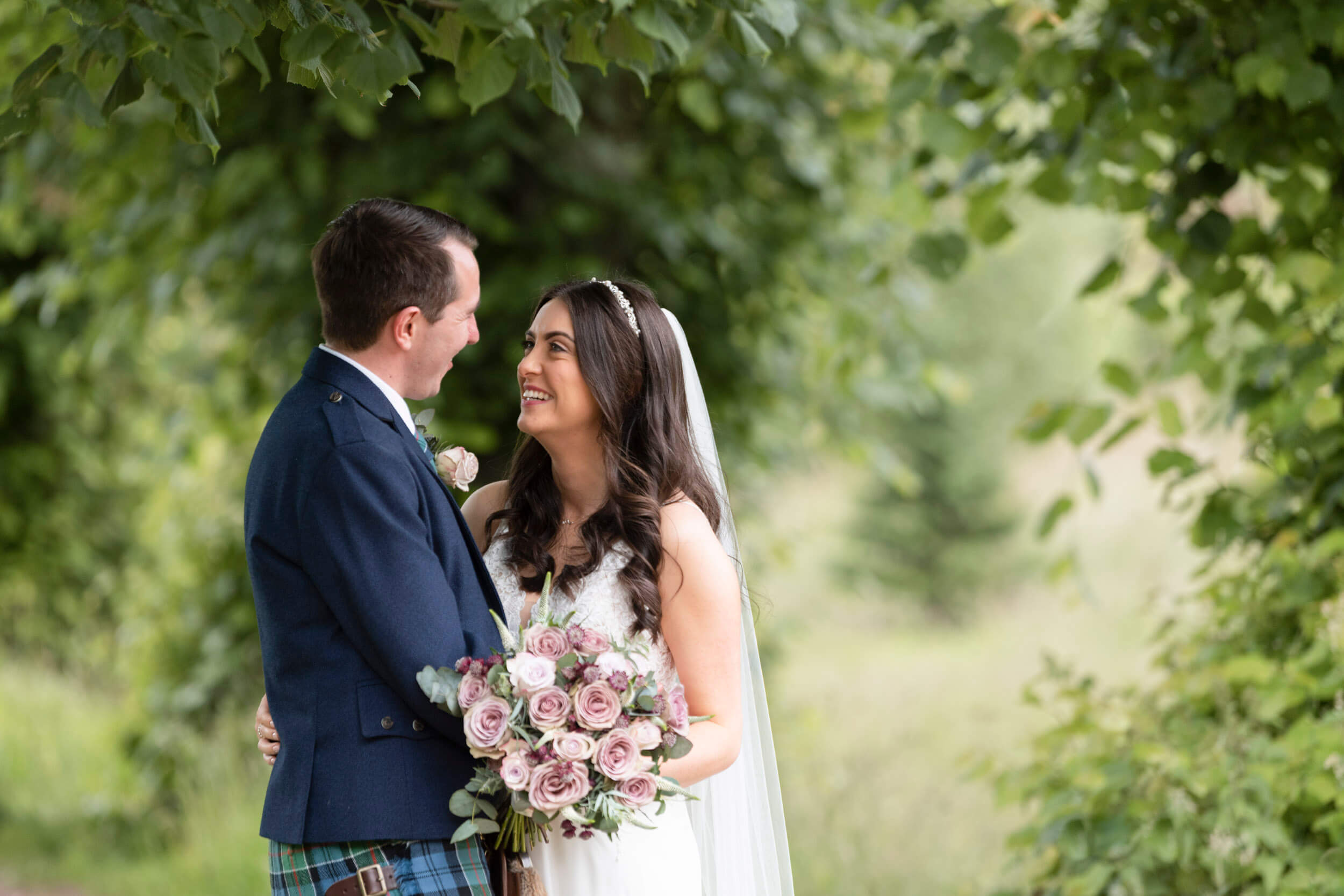 Dumfries House bride and groom at summer wedding in the gardens